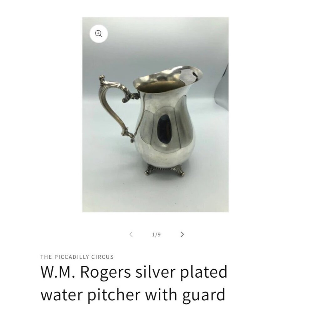 W.M. Rogers Silver Plated Water Pitcher With Guard Preowned in good condition